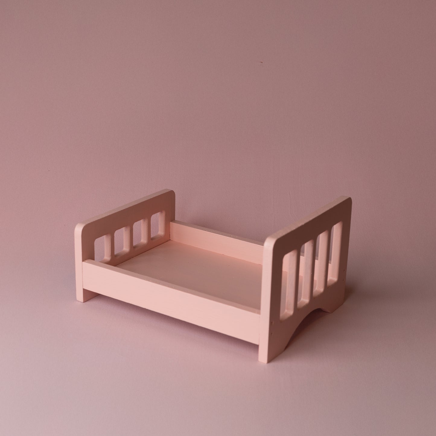 Coral pink posing bed