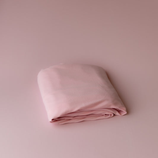 Light pink backdrop/swaddle